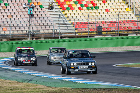Alfa Romeo Giulia - zwei Giulias jagen einen BMW 3-er - beim akademisches Fahrtraining auf dem Hockenheimring 2012