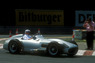 Anlässlich des DTM-Laufes am Norisring von 1992 - Fangio im Mercedes-Monoposto W 196 - ohne Helm (© Daniel Reinhard, 1992) Anlässlich des DTM-Laufes am Norisring von 1992 - Fangio im Mercedes-Monoposto W 196 - ohne Helm (© Daniel Reinhard, 1992)