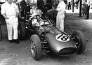 Image: Aston Martin DBR5 (1960) - Salvadori at the wheel of a DBR5 in the pit lane at the 1960 British Grand Prix