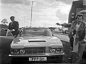 Image: Aston Martin DBS (1970) - Roger Moore and Tony Curtis filming the TV series "The Two"