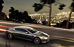 Bild: Aston Martin Rapide (2010) - Beispiel aus dem Buch «The Aston Martin Book» von René Staud