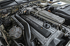 Bild: Audi quattro 20V RHD (1989) – Gut gebrauchter, unrestaurierter Motorraum