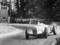 Image: Auto Union Type C (1937) - Bernd Rosemeyer wins the race at Donington Park (Great Britain) in 1937