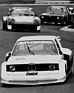 BMW 320 Grp 5 (1977) - Surer vor einem Porsche 934 und einem Ford Escort am Nürburgring