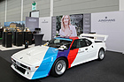BMW M1 (1980) - Strassenfahrzeug in Motorsport-Farbgebung auf dem Junghans-Stand - Motorworld Classics Bodensee 2019