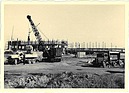 Image: Start of construction of the Hanover-Stöcken plant in 1955 - excavators shoveling sand onto a truck