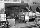 Camping mit Morris Minor Traveller - alles für einen Urlaub - Genfer Automobilsalon 1956