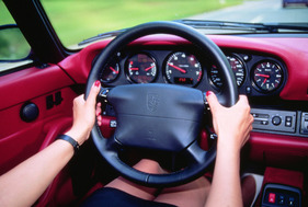 Image: The Tiptronic S automatic gearshift system with two paddle shifters on the steering wheel of the Porsche 911 Carrera provides a new Porsche driving experience from model year 1995 onwards