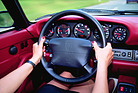Image: The Tiptronic S automatic gearshift system with two paddle shifters on the steering wheel of the Porsche 911 Carrera provides a new Porsche driving experience from model year 1995 onwards