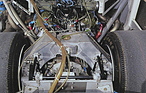De Dion-Rohr in Kastenform, über der Achse beim Chaparral 2H von 1969 - speziell hier, dass das horizontale Drehgelenk zwischen den beiden „Rohr“-Hälften geführt wird