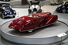 Delahaye 165 Roadster (1938) – verkleidete Räder und wellenartige Chromleisten am Karosseriesaum
