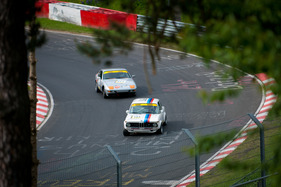 The Nordschleife with its extremely hilly course offers many different perspectives of the track - here a BMW 2002 at the 3-hour ADAC Eifelrennen 2013, a bend before the carousel