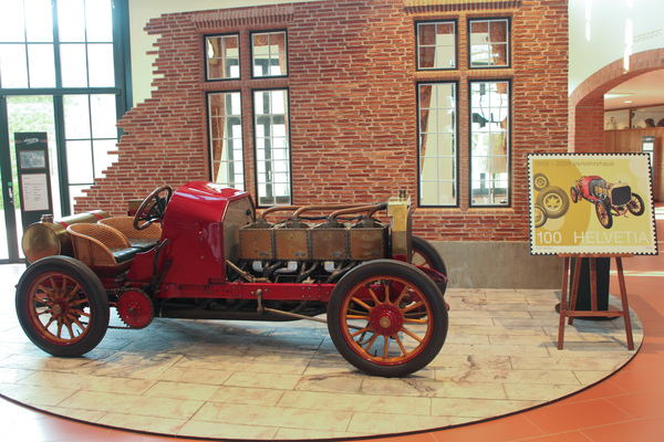 Image: Dufaux racing car with stamp dedicated to him - launch of the four Swiss stamps at the Emil Frey Classic Center