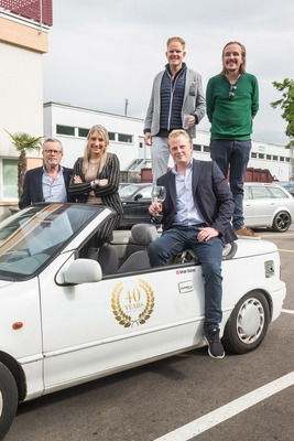 Image: An unorthodox anniversary gift, the Suzuki Cabriolet, presented to Serge Stotzer and Reinhard Schmidlin by Gregory Holzapfel and Friends