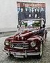 Image: Impressions of the O iO (Oldtimer in Obwalden) meeting - The friendly nuns from Sarnen greet you from the poster behind the Fiat Topolino