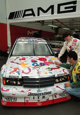 Ellen Lohr und Andora mit dem AMG Mercedes-Benz Rennsport-Tourenwagen 190 E 2.5-16 Evolution II (Andora-Design) - 200 Meilen von Nürnberg 1991