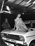 Frauen und Autos - im knallgelben Organdi auf dem Opel Kadett - Genfer Autosalon 1968