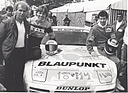 Glemser als Porsche 944 Turbo-Cup-Manager mit Motorrad-Gaststartern Martin Wimmer und Eddy Lawson