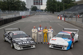 Harald Grohs, Jochen Neerpasch (Vater vom M1), Jan Lammes und Marc Surer (v.l.n.r.) mit BMW M1 Procar am Norisring 2019