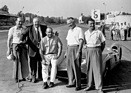 Image: Hermann Lang, Alfred Neubauer, Jaun Manuel Fangio, Karl Kling and Hans Herrmann - Italian Grand Prix in Monza (1954)