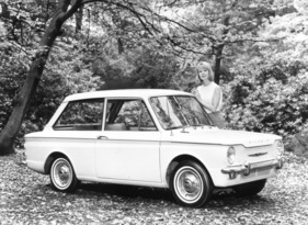 Hillman Imp de Luxe (1963) - adrett arangiert mit Dame