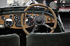 Wooden dashboard and cord-wrapped steering wheel in a Lagonda – Classic Expo 2026