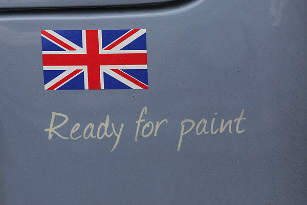 Impressionen Arosa ClassicCar 2012 - Humoristischer Kleber auf dem Ford Prefect 'the Reverend car' von Stefan Vitelli