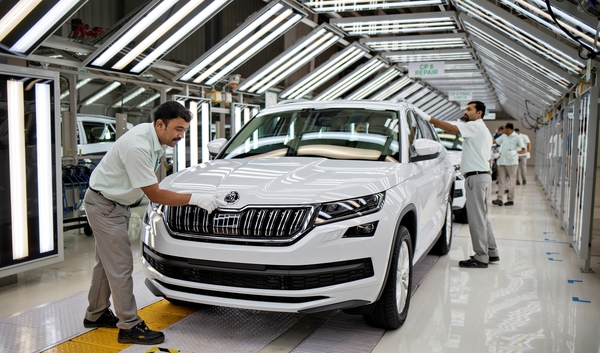 Image: Indian workers manufacture modern Skodas in the Pune and Aurangabad plants