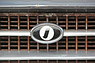 Innocenti C (1968) - Innocenti-Zeichen im Kühlergrill (© Daniel Reinhard, 2022) Innocenti C (1968) - Innocenti-Zeichen im Kühlergrill (© Daniel Reinhard, 2022)