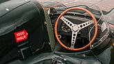 Image: Jaguar D-Type (1956) - The huge wooden steering wheel dominates the cockpit