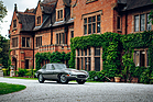 Image: Jaguar E-Type (1961) - Chassis 885005 in front of Wappenbury Hall