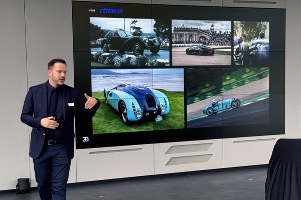Image: Jascha Straub, Manager Individualization from the Design department, explains the influences of the Bugatti tradition on the design of the tourbillon