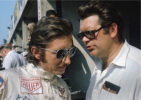 Jo Siffert mit BRM-Team-Manager Tim Parnell in Monza 1971