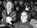 Jung-Rennfahrer Harald Grohs mit F1-Champion Emerson Fittipaldi beim Fototermin