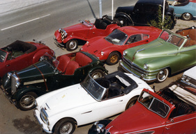 Klassiker und Liebhaberfahrzeuge bei der Touring Garage in den Achtzigerjahren