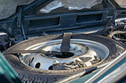 Image: Lada Niva 1.7i (2004) - spare wheel installed flat in the engine compartment