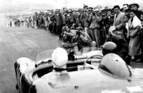 Lancia D24 an der Carrera Panemericana Mexico 1953 - Juan Manuel Fangio beim Start zur letzten Etappe von Chihuahua nach Ciudad Juarez