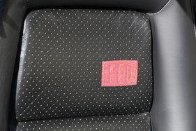 Lancia Delta HF Integrale 8V (1991) - HF-Zeichen im Sitzüberzug