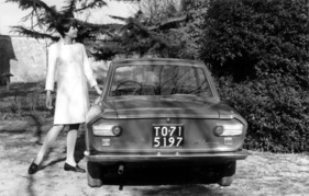 Lancia Fulvia Coupé Rallye 1.3 (1967) - Heckansicht mit Dame