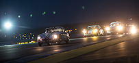 Image: Le Mans Classic 2014 - the Le Mans TVR Grantura, pursued by Porsche 356 and MG B