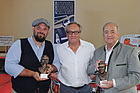 Image: On the left "Mr. Avus" Ulf Schulz, in the middle AHG Chairman Wolfgang Blaube and on the right Prof. Dr. Peter Kirchberg - Metternich Days 2022 of the Automobilhistorische Gesellschaft e. V.
