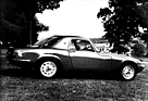 Lotus Elan S3 (1965) - frühes Coupé, noch ohne Lüftungschlitze, dafür mit Zentralnaben