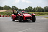 Lotus Seven Series 4 (1971) - auf der Rennpiste von Lignières - Huber zeigt an, dass er an die Boxen fährt (© Bruno von Rotz, 2013) Lotus Seven Series 4 (1971) - auf der Rennpiste von Lignières - Huber zeigt an, dass er an die Boxen fährt (© Bruno von Rotz, 2013)