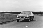 MG B GT (1966) - am Lenkrad sitzt Paddy Hopkirk
