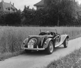 MG Midget Series TF (1954) - Ansicht von schräg hinten