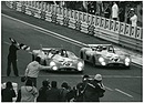 Image: Matra MS 670 (1972) - the two victorious Matras cross the start-finish line at Le Mans 1972, with Cevert in second place on the right