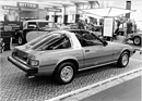 Mazda RX7 Beutler Twin-Top (1980) - sauber ausgeführte Targa-Variante, im Hintergrund ein Bugatti Typ 57 - Genfer Autosalon 1980
