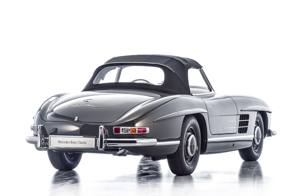 Image: Mercedes-Benz 300 SL Roadster (W 198) (1957) - commercial vehicle from Mercedes- Benz Classic. Exterior shot from right rear with closed soft top