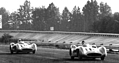 Mercedes-Benz RW196 (1954) – Großer Preis von Italien 1955: Moss dicht hinter Fangio – vielleicht zu dicht, denn ein aufgewirbelter Stein wird kurz darauf seine Windschutzscheibe zerschlagen (© Daimler-Benz AG, 1954) Mercedes-Benz RW196 (1954) – Großer Preis von Italien 1955: Moss dicht hinter Fangio – vielleicht zu dicht, denn ein aufgewirbelter Stein wird kurz darauf seine Windschutzscheibe zerschlagen (© Daimler-Benz AG, 1954)