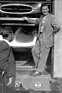 Image: Mercedes Benz W 196 (1954) - Hans Herrmann poses next to the new streamlined racing car in Reims
